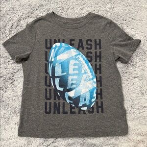 Football T-shirt boys size 6-7.